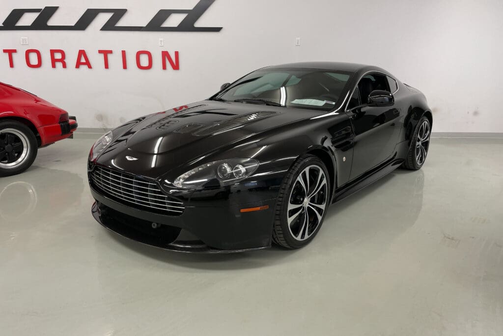 2011 ASTON MARTIN V12 VANTAGE 2DR CPE MAN CARBON BLACK
